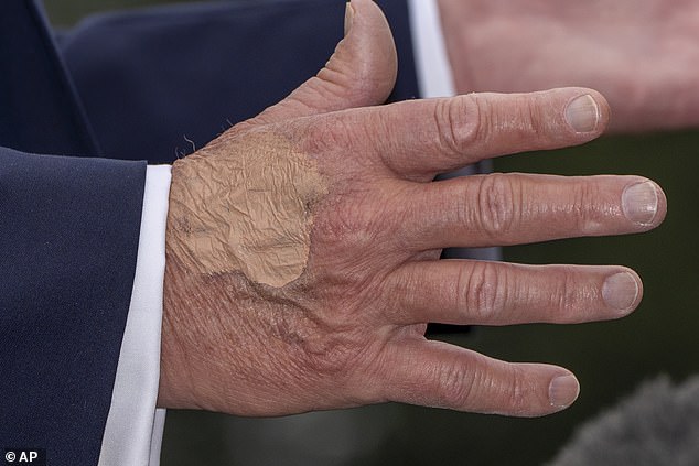 President Donald Trump gestures with his hands as he speaks with reporters before departing on Marine One from the South Lawn of the White House, Tuesday, Sept. 16, 2025, in Washington