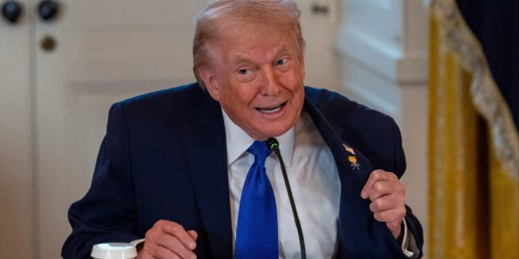 Trump tells Denmark 'we can do this the easy way or hard way' as he claims US needs Greenland to stop China and Russia