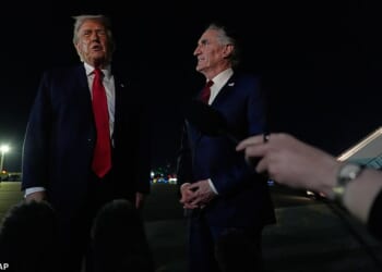 Donald Trump (pictured left) went back and forth with Emmanuel Macron Monday night, threatening him with a 200 percent tariff before revealing a text message from the French president