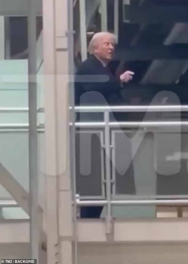 Trump appears to mouth 'f*** you' to the heckler before walking away