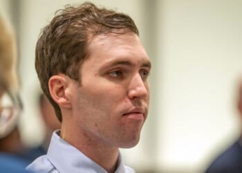 Tyler Robinson, accused of fatally shooting Charlie Kirk, appears during a hearing in Fourth District Court on Dec. 11, 2025, in Provo, Utah. Prosecutors have charged Tyler Robinson with aggravated murder and plan to seek the death penalty.