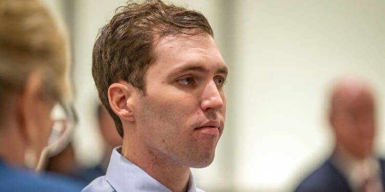 Tyler Robinson, accused of fatally shooting Charlie Kirk, appears during a hearing in Fourth District Court on Dec. 11, 2025, in Provo, Utah. Prosecutors have charged Tyler Robinson with aggravated murder and plan to seek the death penalty.