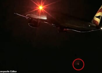 A British Airways plane lost a wheel during takeoff in Las Vegas on Monday night. Picture shows the moment the tyre dropped off the plane's landing gear