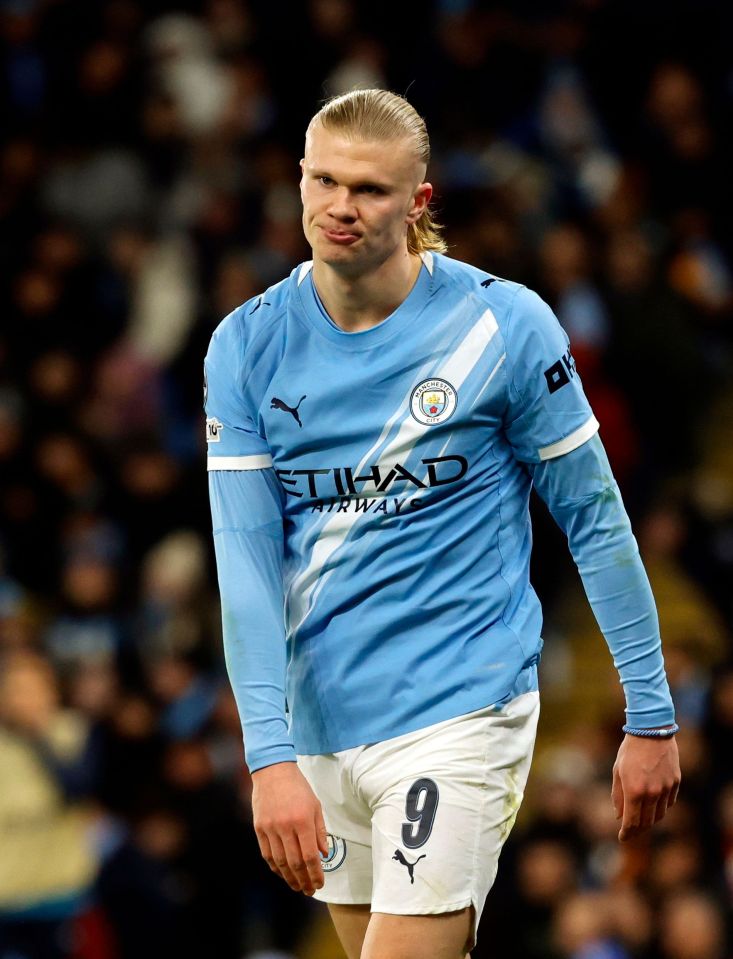 Erling Haaland in his light blue Manchester City kit, with the number 9 on his shorts, during a UEFA Champions League match.