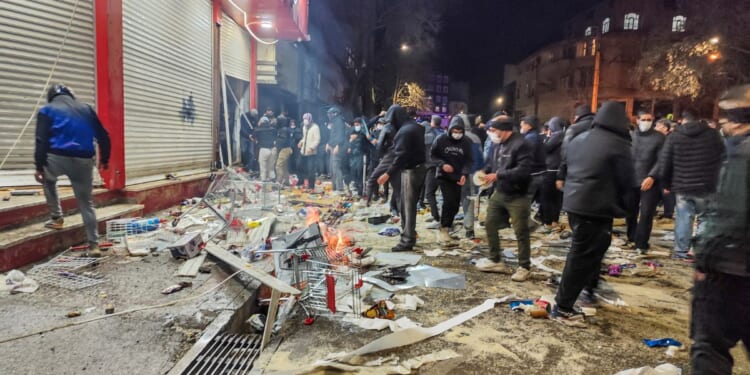 Iranians gather while blocking a street during a protest in Kermanshah, Iran, on Jan. 8, 2026.