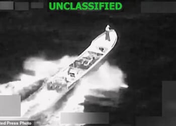 This image from video provided by U.S. South Command, shows a vessel accused of trafficking drugs in the eastern Pacific Ocean shortly before it was destroyed by the U.S. military, killing two and injuring one, on Jan. 23, 2026. (U.S. Southern Command via AP)