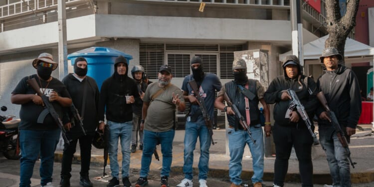 Urgent 'do not travel' warning issued & Americans told to leave Venezuela immediately as gangs ‘hunting for Trump fans'