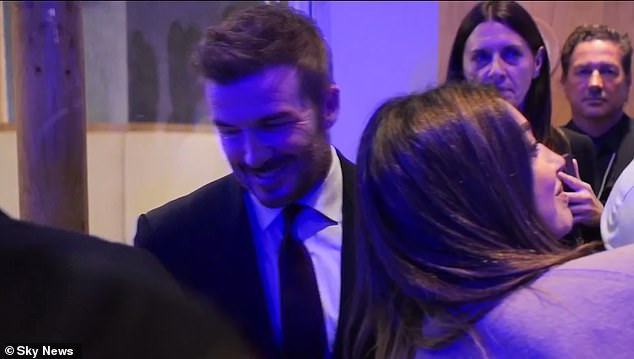 On Tuesday morning, David ignored questions about son Brooklyn's post as he made an appearance at the World Economic Forum in Davos