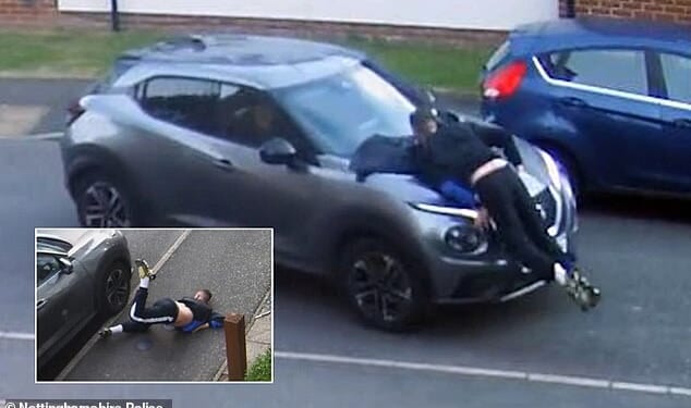 Kieran Hogan's feet lift off the ground as he is hit by the Nissan