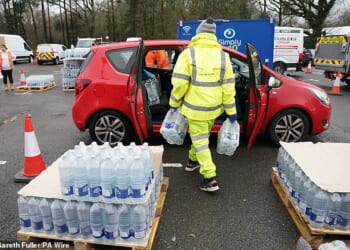 South East Water is raising bills by an average 7 per cent to £324 a year after its customers suffered days of supply disruption this month (East Grinstead, pictured on January 12)