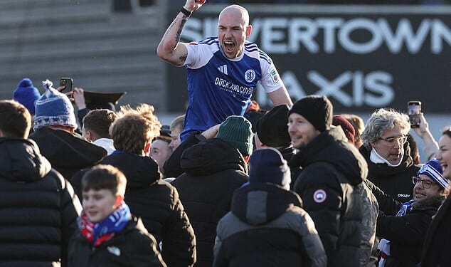 Macclesfield fans invaded the pitch after their side cause the FA Cup's biggest ever upset