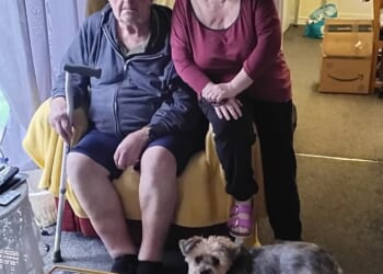 Michael (left), Glenda (right) and their dog Rusty were forced to leave their home with only a couple of days' notice as it was at risk of collapse due to rapid erosion