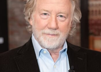An arrest warrant has been issued for actor Timothy Busfield for allegedly inappropriately touching a minor on a TV show set