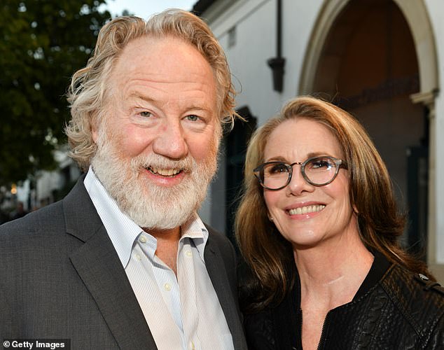 Busfield (pictured with his wife, actress Melissa Gilbert) is being sought by cops and is facing two wounds of criminal sexual contact of a minor and one count of child abuse