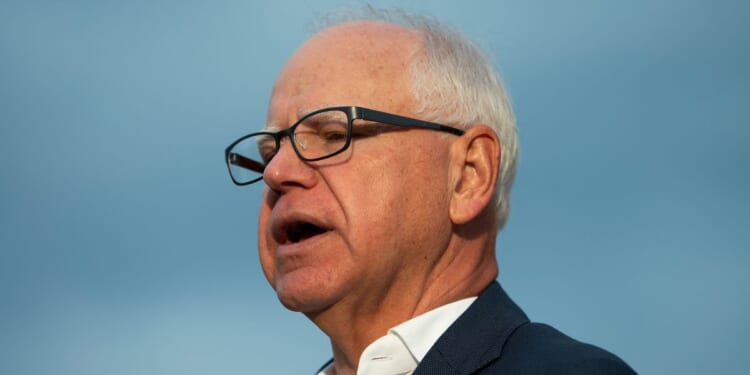 Minnesota Gov. Tim Walz speaks to media gathered on the first day of school at Deerwood Elementary on Sept. 2, 2025, in Eagan, Minnesota.