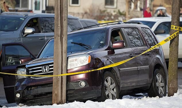 A woman was allegedly shot by an Immigration and Customs Enforcement (ICE) officer before crashing her car in Minneapolis. The woman's burgundy SUV was seen with a bullet hole