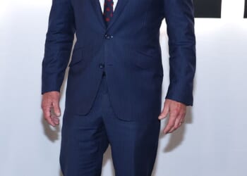 Color clash! United States Secretary of Health and Human Services Robert F. Kennedy Jr. looked a bit mismatched as he sported a navy blue pinstripe suit. He paired it with shiny black dress shoes that seemed to clash, along with a white button-down shirt and red printed tie