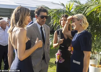 Zara Tindall shades herself from the sun as she speaks to Delfina Blaquier and Nacho Figueras