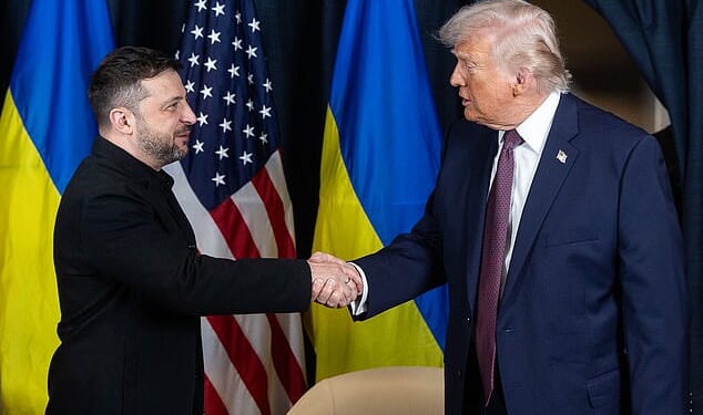 Volodymyr Zelensky and US President Donald Trump shaking hands during their bilateral meeting on the sidelines of the World Economic Forum (WEF) annual meeting in Davos on January 22, 2026