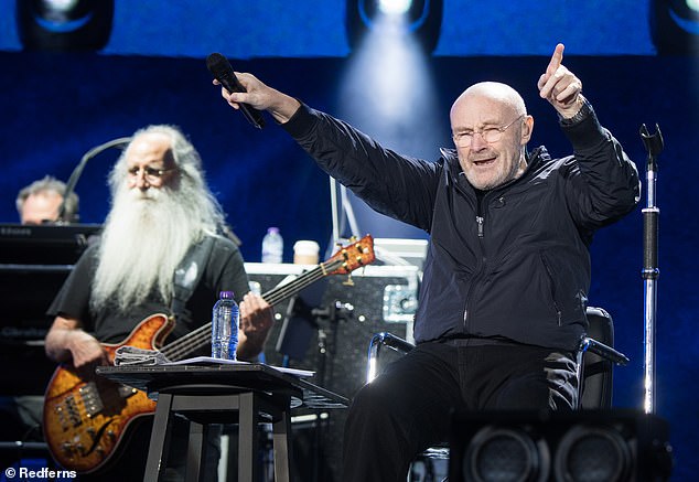 Lily penned a gushing caption about how proud she was of all his incredible accomplishments after retiring amid health woes  (Phil pictured on stage in 2017)