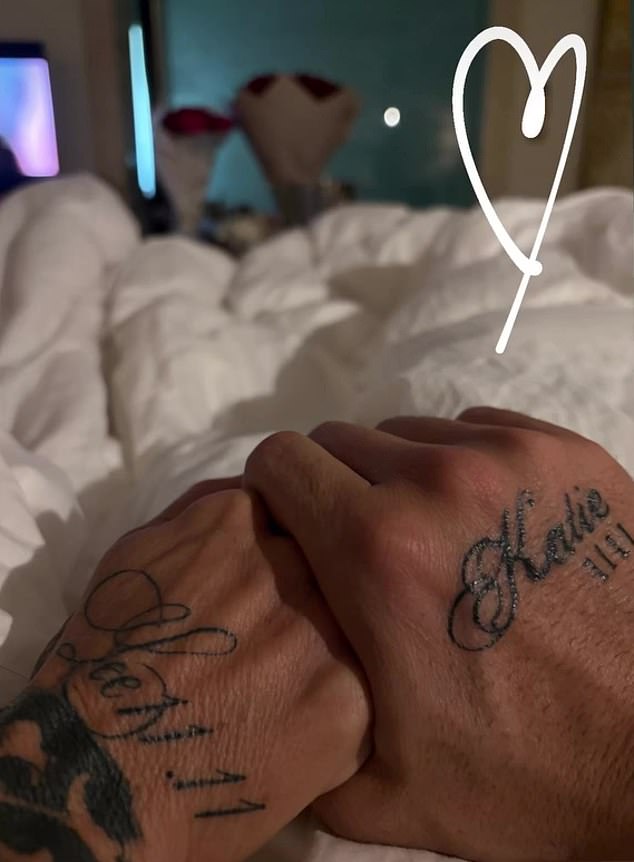 Katie and Lee have each others name inked on the back of their hands, with the angel number 11 11, which represents love and deep connection