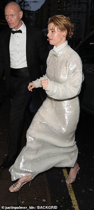 Her dress shimmered in the light