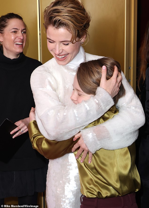 The pair looked in great spirits as they embraced