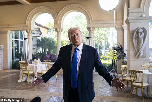 President Donald Trump speaks to reporters at his Mar-a-Lago club ahead of the nuptials. The bride and groom met while working in his administration - and he decided to host their wedding at his private estate