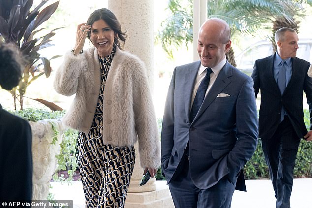 Noem and Miller casually laughed and joked as they made their way inside