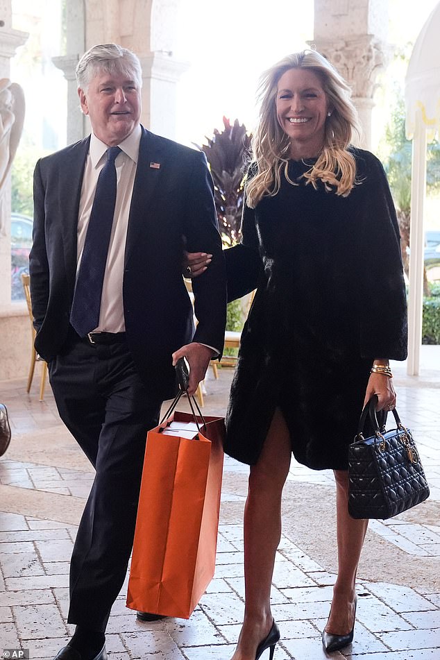 Fox News power couple Sean Hannity and Ainsley Earhardt were present at the wedding - with Earhardt styling her all-black outfit with an iconic Dior Lady Diana bag