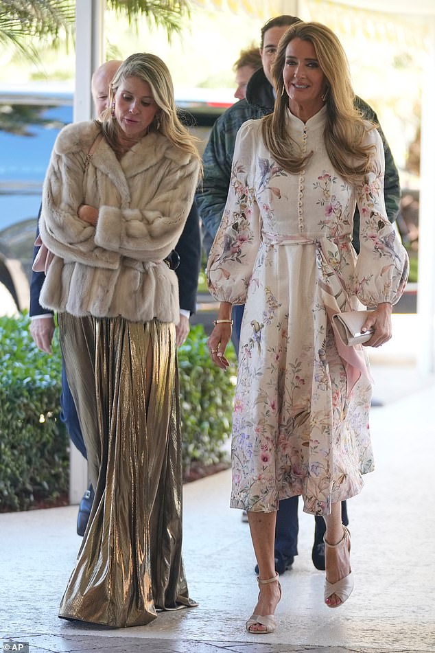 Small Business Administration administrator Kelly Loeffler, right, arrives at The Mar-a-Lago Club