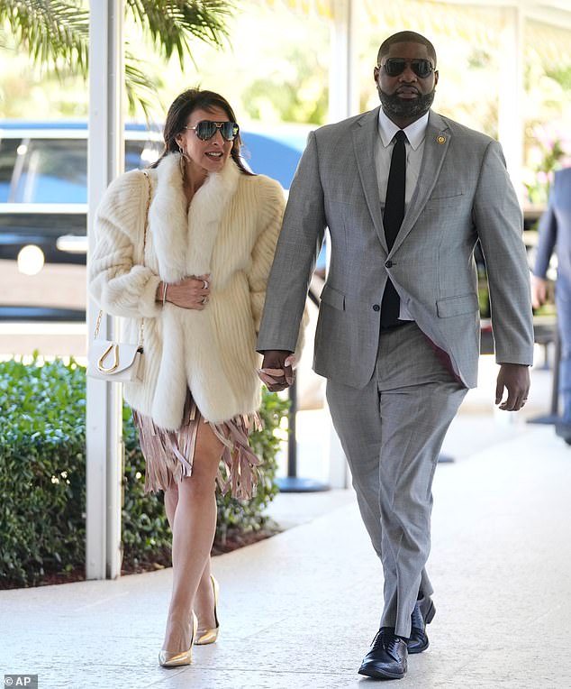 Republican rep. Byron Donalds, right, arrives for the wedding in Florida