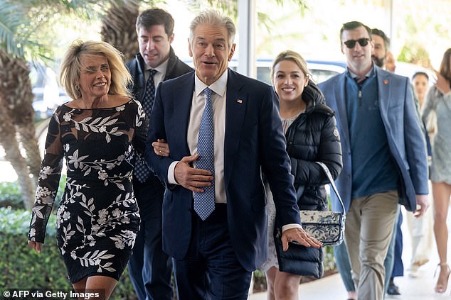 Medicare and Medicaid Administrator Mehmet Oz and wife Lisa Oz arrive to attend the wedding of Dan Scavino