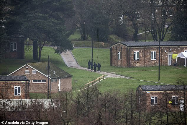 Migrants are seen at the Crowborough Training Camp, a former military site last week
