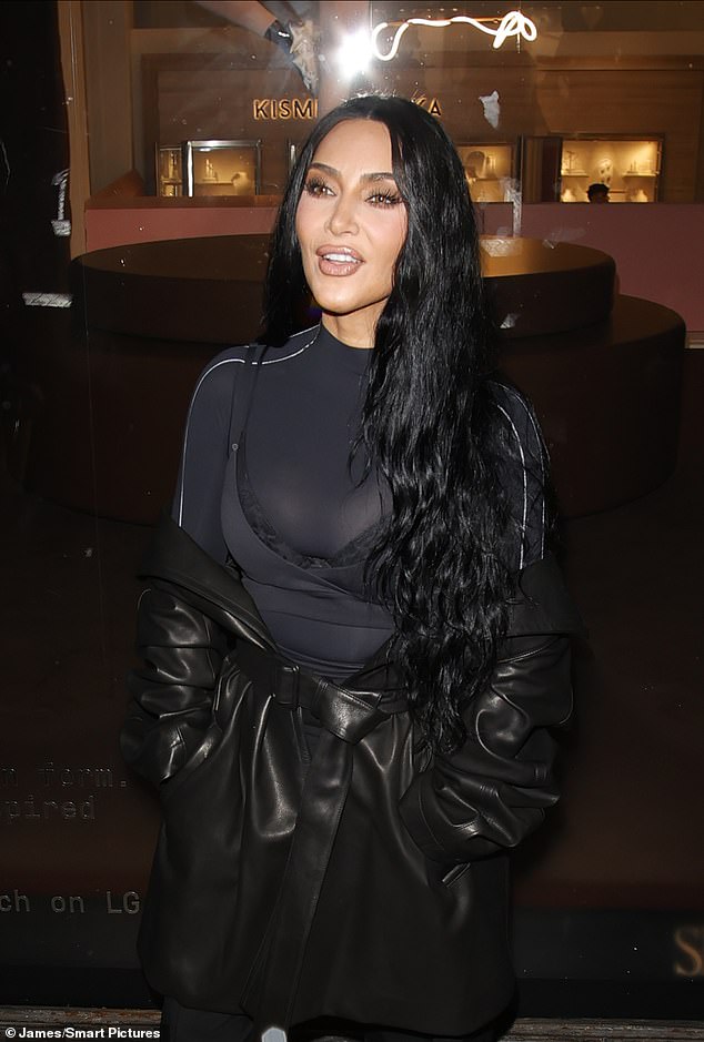 The US superstar, 45, flew into the UK this week forn a romantic weekend away with the Formula 1 ace, 41 (Kim pictured in London on Sunday evening)