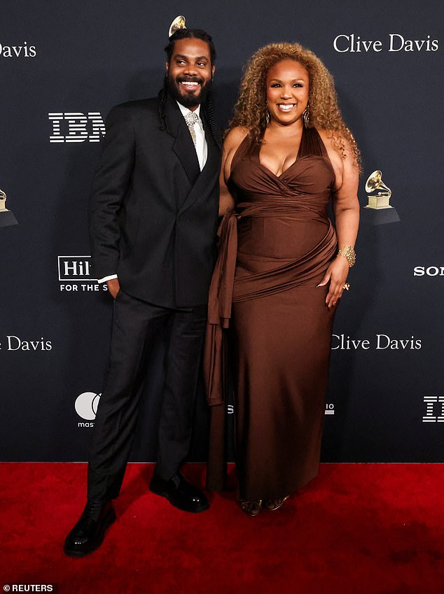 Lizzo made a glamorous arrival alongside her longtime partner Myke Wright on the red carpet