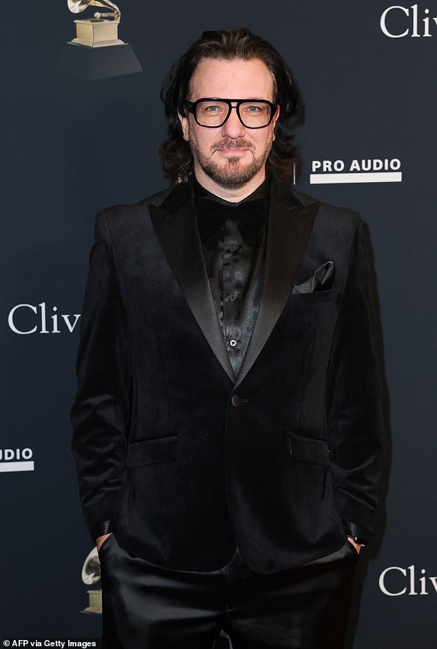 *NSYNC star JC Chasez looked dashing as he rocked a suede blazer paired with a satin button-down and silk dress pants for an elevated take on a classic suit