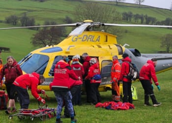Teenager is airlifted to hospital after plunging 65ft at beauty spot during a walk