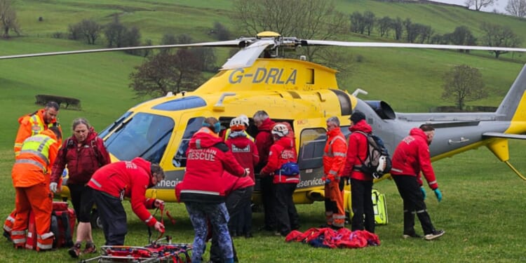 Teenager is airlifted to hospital after plunging 65ft at beauty spot during a walk