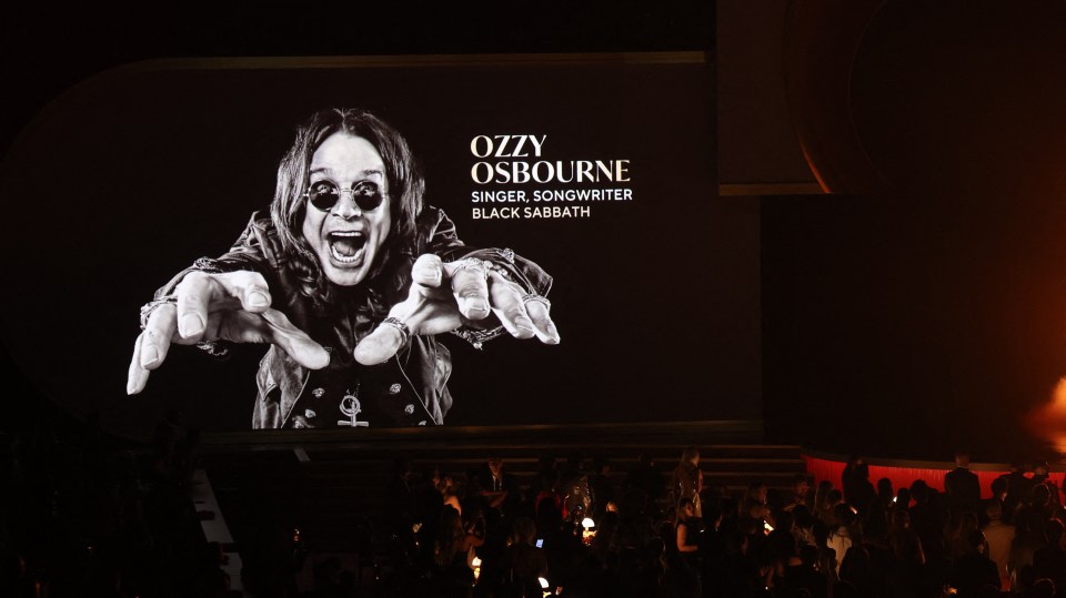 Black and white image of Ozzy Osbourne on a large screen during the In Memoriam segment of the 68th Annual Grammy Awards.