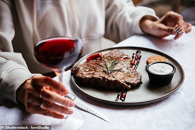 Alcohol in wine or beer damages cells in the digestive tract that are responsible for absorbing the vitamins B1, B12, and folic acid found in meat (stock image)