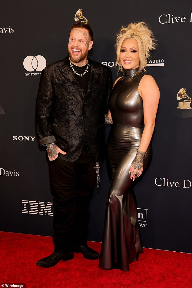 His glamorous wife, Bunnie Ox, was by his side