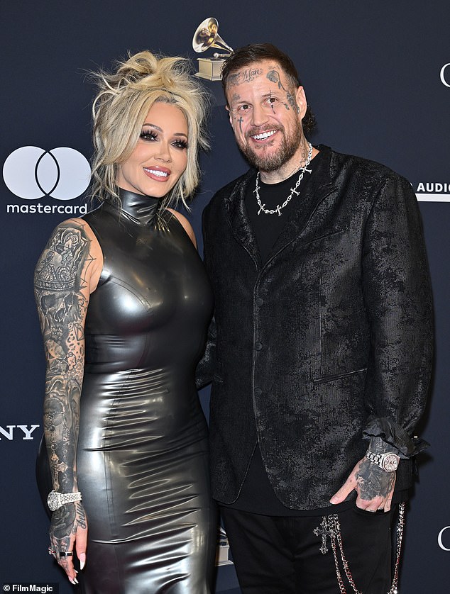 Bunnie Xo wowed in a curve-clinging metallic turtleneck dress and a messy yet fashionable updo