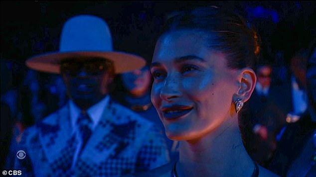 As Justin sang the emotional track, which he has previously revealed was written about his wife, cameras repeatedly cut to Hailey in the audience as she smiled proudly