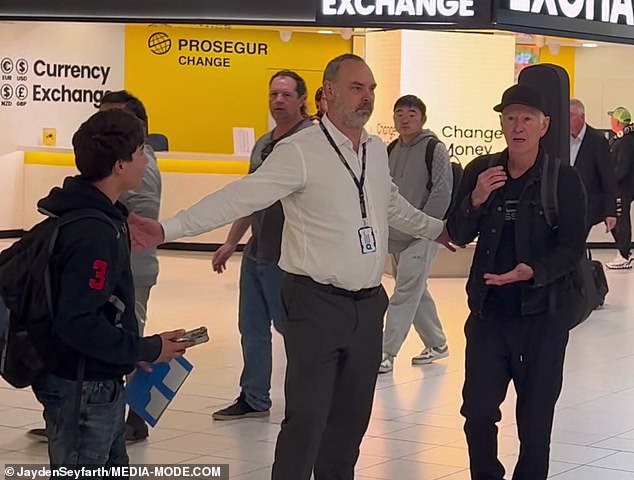 Officials needed to step in to separate McEnroe and the young fan as the situation escalated