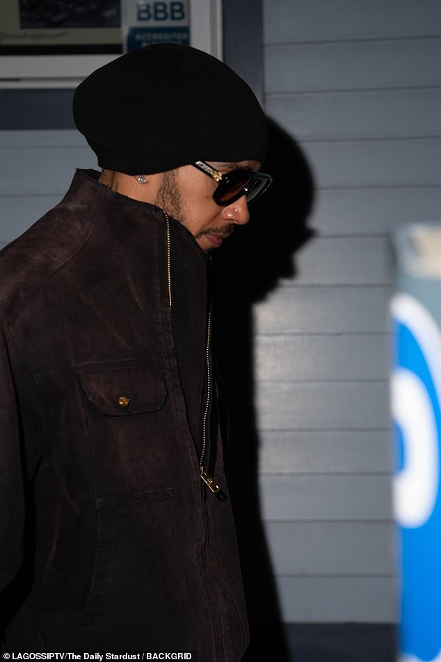Meanwhile, Lewis sported a dark grey jacket with baggy jeans and boots, accesorising his party look with a beanie and shades