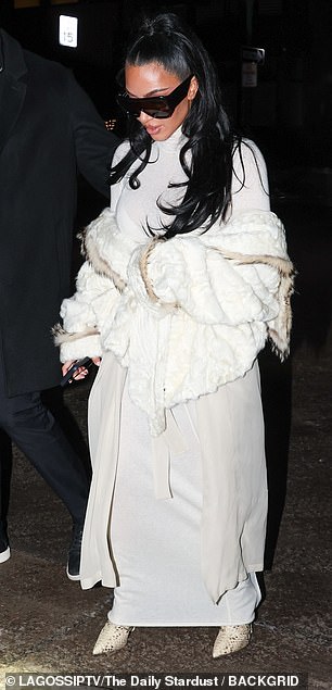 Kim was also seen earlier in the evening wearing an all white look