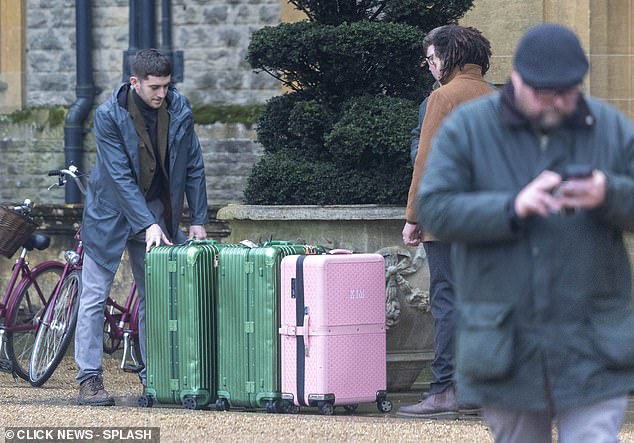 Kim didn't seem to mind who knew she was there as she was sporting brightly coloured monogrammed luggage