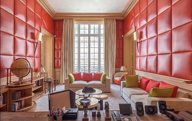 Sky News says its analysis suggests the picture was taken in Epstein's office, due to matching lamps and red panelling