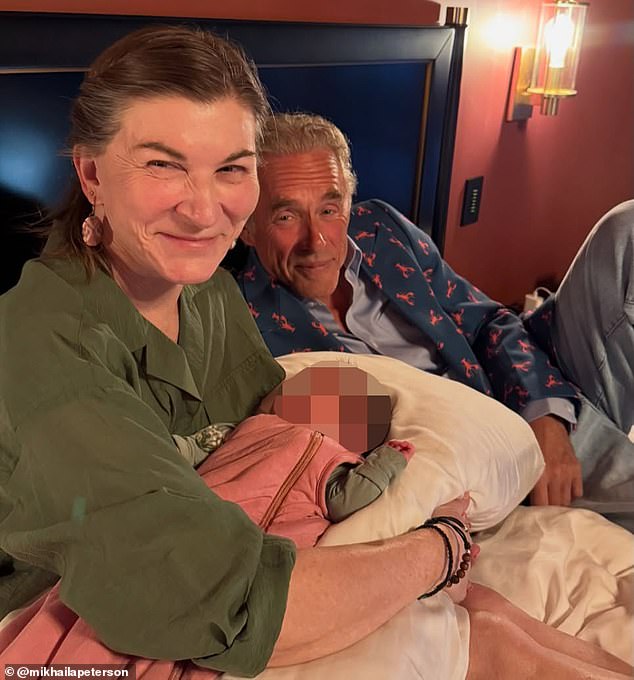 Tammy, Peterson’s wife, credits her kidney cancer recovery with ‘rosaries that were blessed by the Pope’ (pictured, Tammy holding granddaughter Audrey)